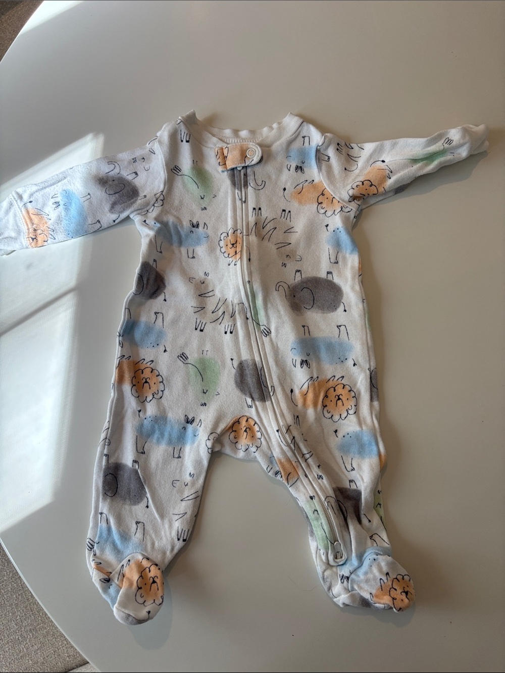 Carter's White Footed One-Piece with Blue, Green, Gray, and Orange Animal Prints